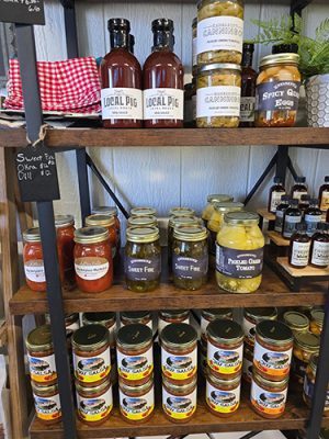 Homemade canned sauces, pickles and salsas on the shelves